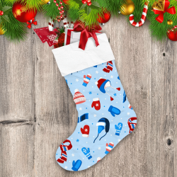 Christmas Pattern Of Winter Hats Mittens Scarves And Snowflakes On Light Blue Background Christmas Stocking