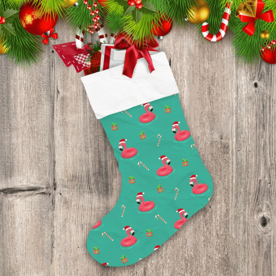 Christmas Tropical Flamingo Swim Ring And Candy Cane Christmas Stocking