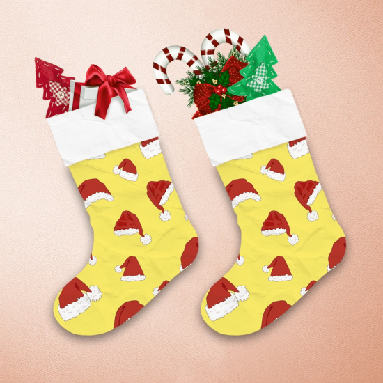 Red Christmas Hats In Yellow Background Christmas Stocking 1
