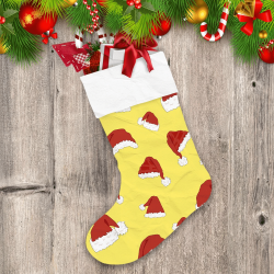 Red Christmas Hats In Yellow Background Christmas Stocking