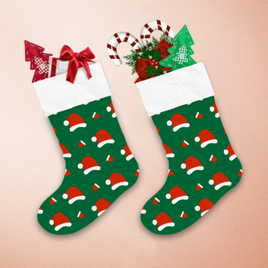 Santa Hat And Christmas Gloves On Green Background Christmas Stocking 1