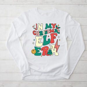 In My Christmas Elf Era Xmas Groovy Santa Christmas Shirts Funny Longsleeve Tee