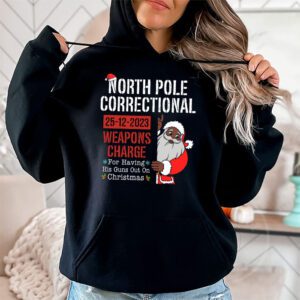 North Pole Correctional Weaponds Charge His Guns Out On Xmas Hoodie 1 3